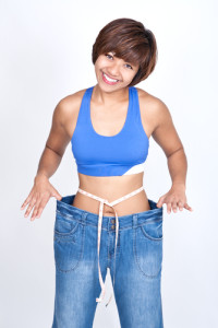 woman in jeans that are too big